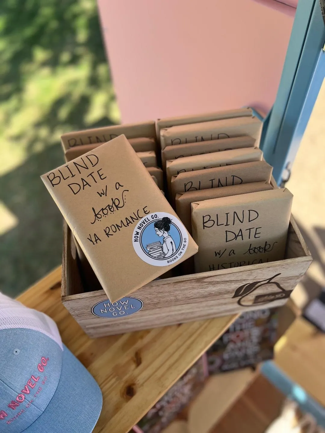 Wooden crate of wrapped blind-date books